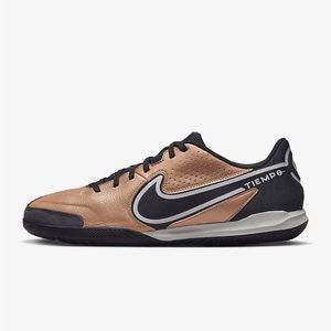 Gold Nike indoor soccer cleats